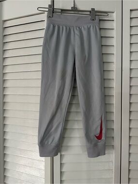 Nike Kids Light Gray Leggings with Red Swoosh